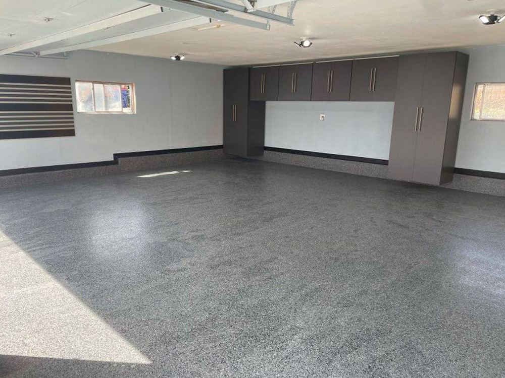Quality residential epoxy floor by NuWave Garages.