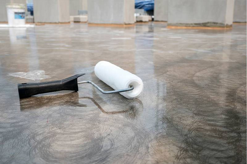Professional epoxy floor removal by NuWave Garages in Loveland, CO.