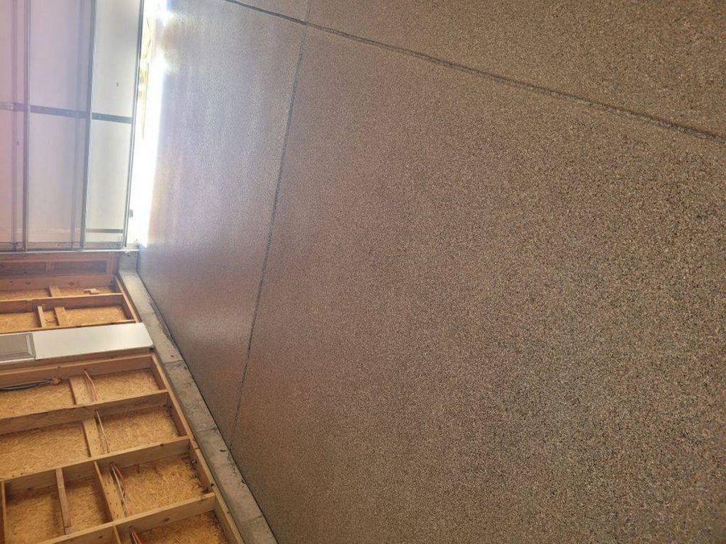 Quality polyaspartic floor coating by NuWave Garages.